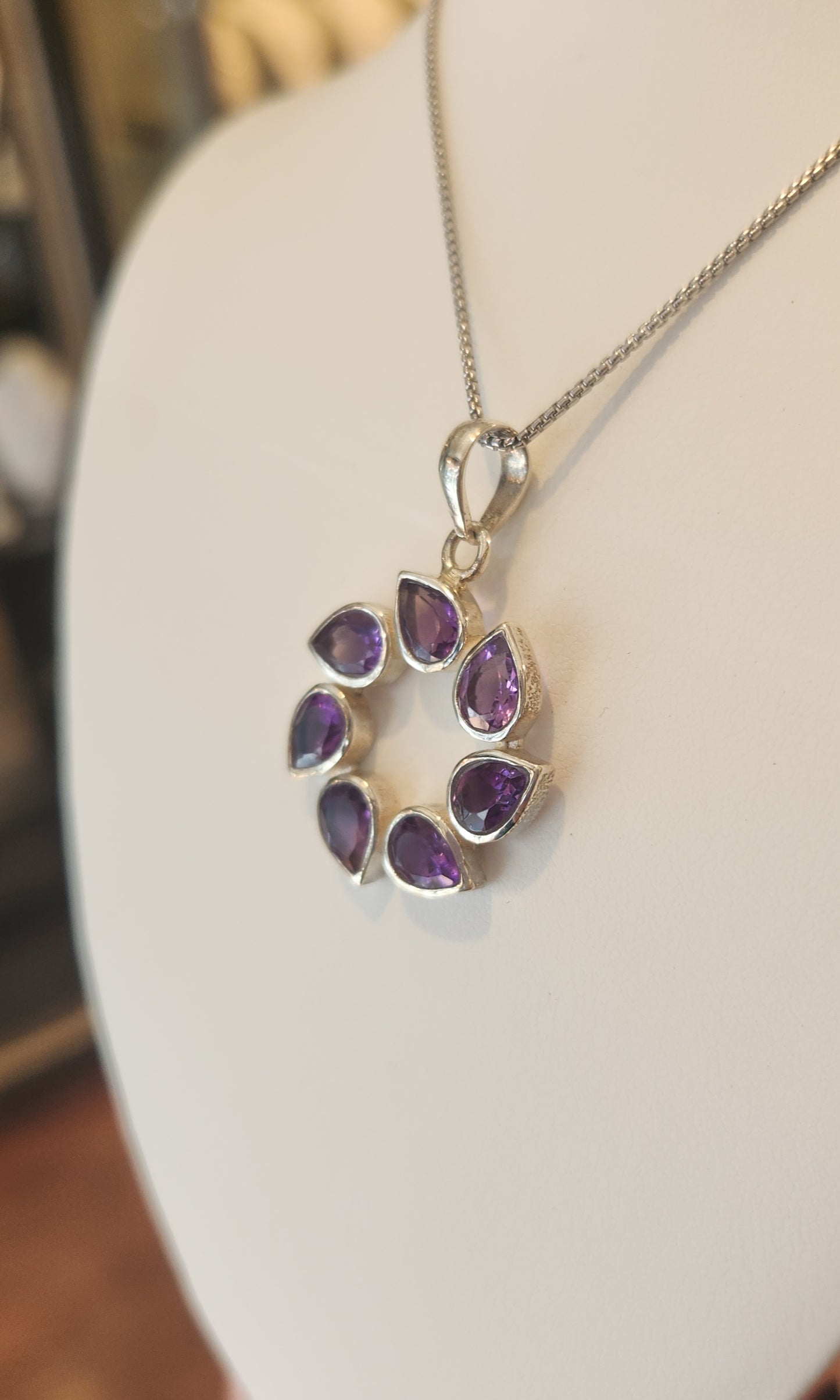 Sterling silver pear-shaped amethyst circle pendant