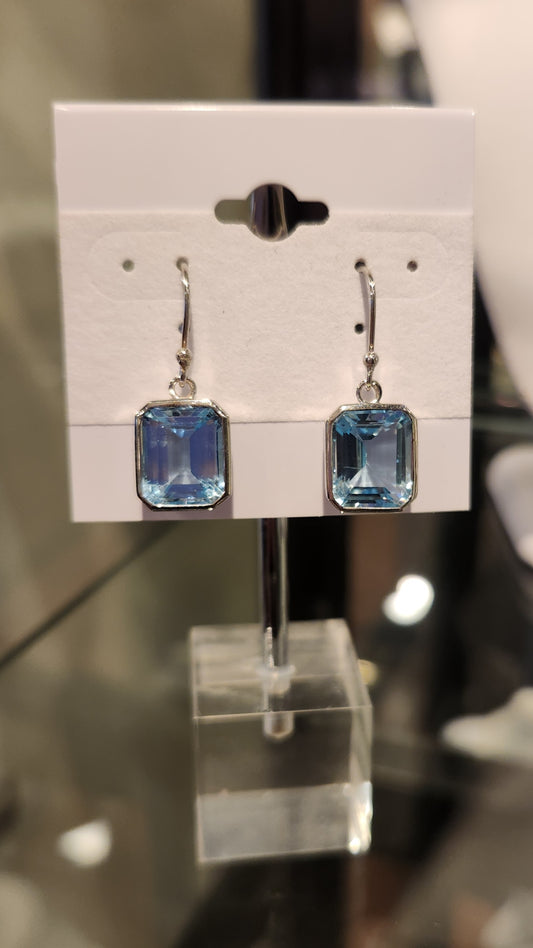 Sterling silver emerald-cut blue topaz earrings