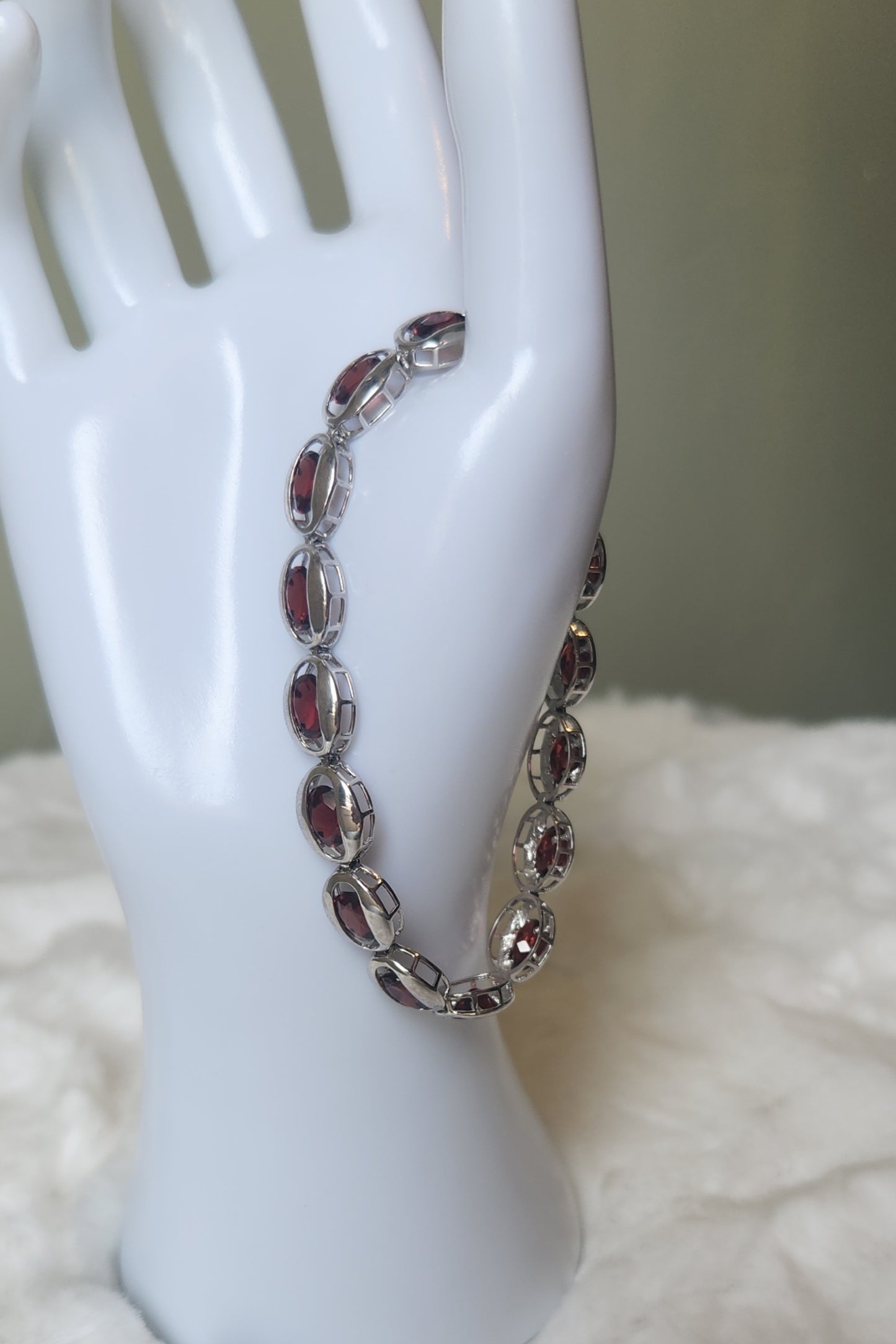 Sterling silver floating bezel garnet tennis bracelet