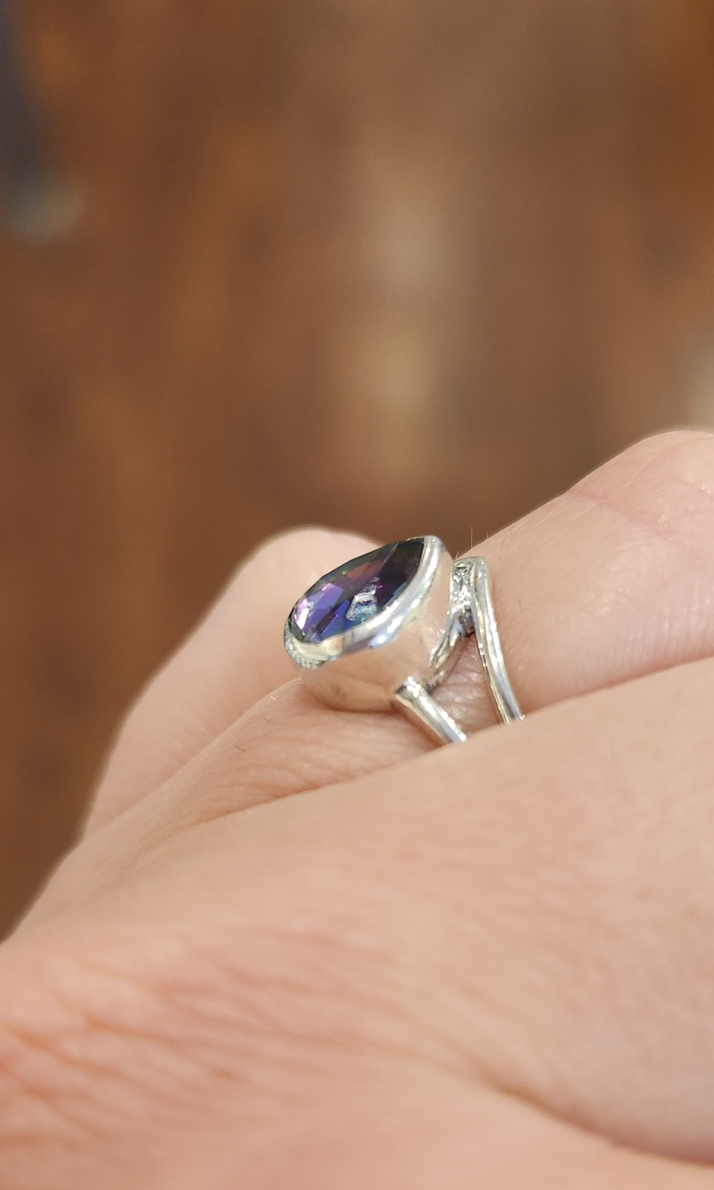 Sterling silver pear-shaped mystic topaz ring