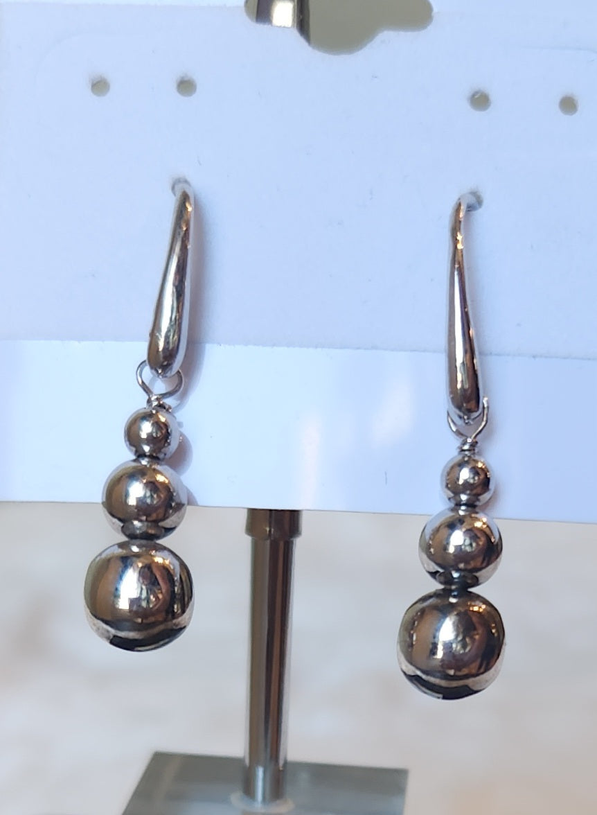 Sterling silver triple-ball dangle earrings