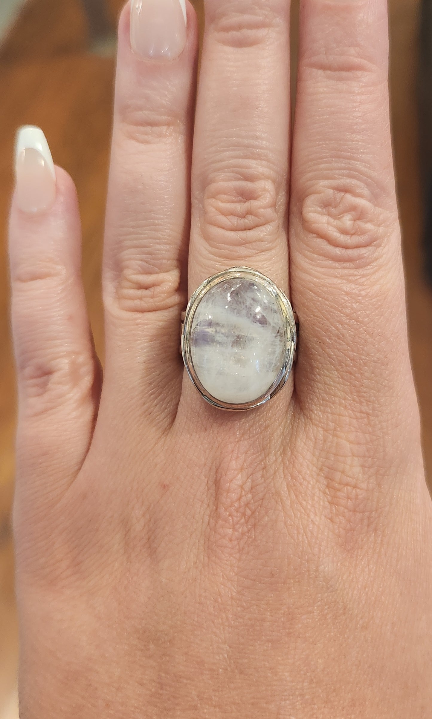 Sterling silver oval-shaped rainbow moonstone statement ring