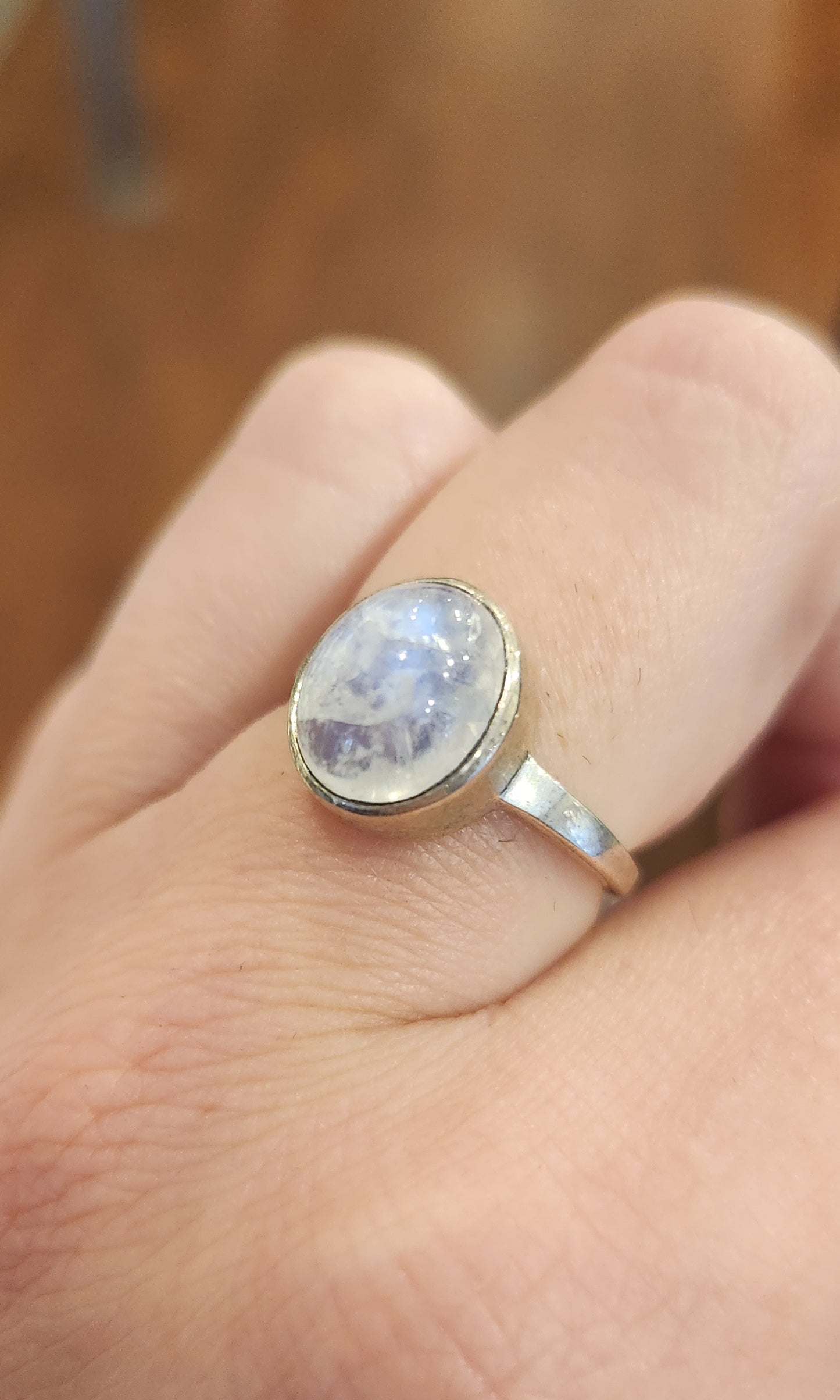 Sterling silver oval rainbow moonstone ring