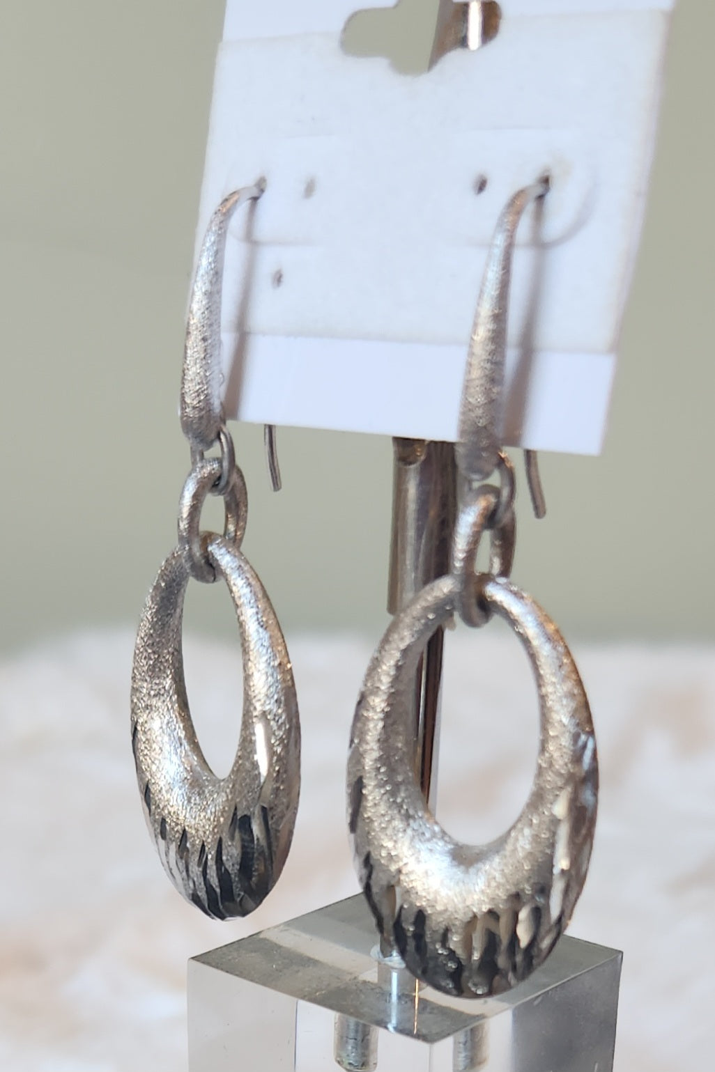 Sterling silver textured oval dangle earrings