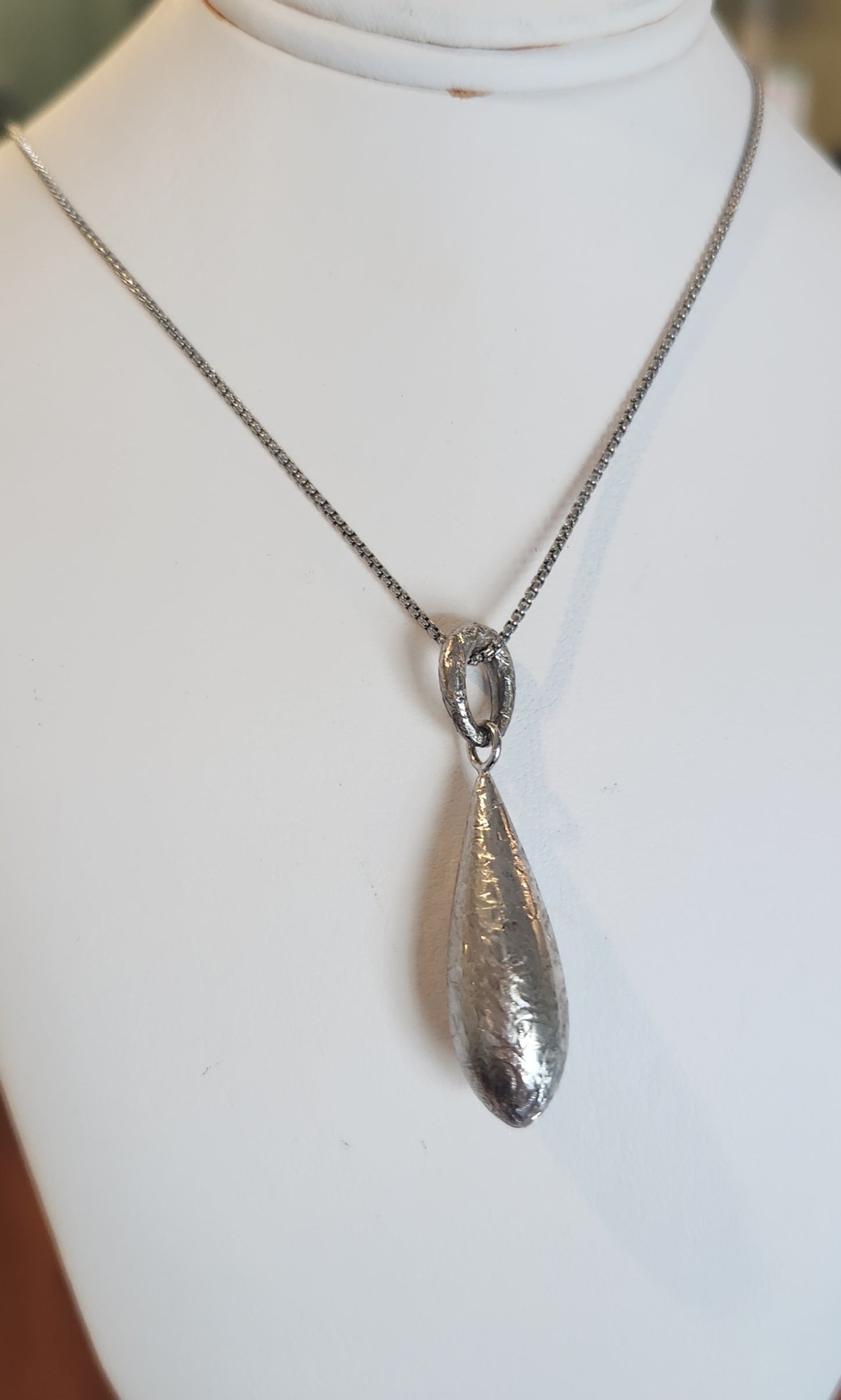 Sterling silver textured teardrop pendant