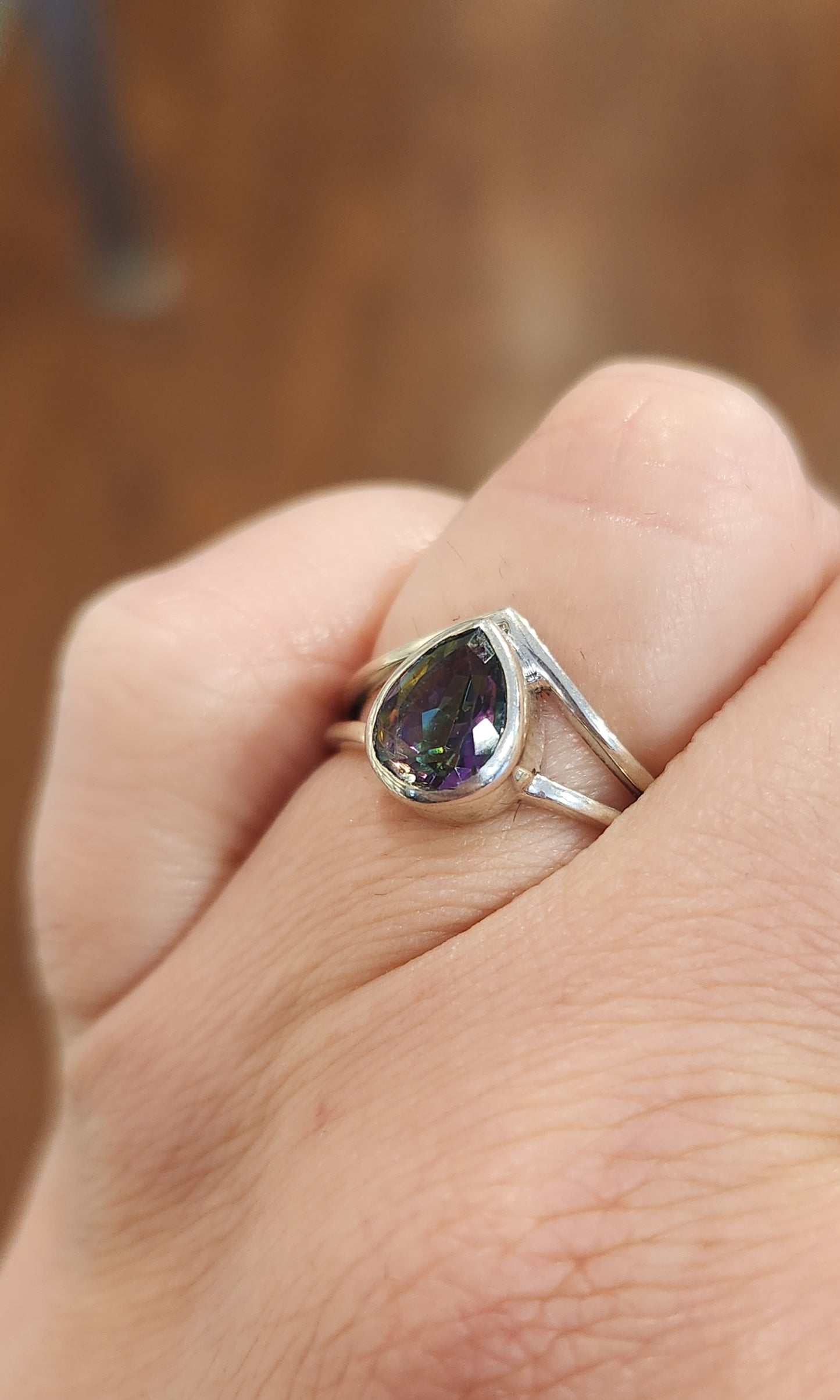 Sterling silver pear-shaped mystic topaz ring