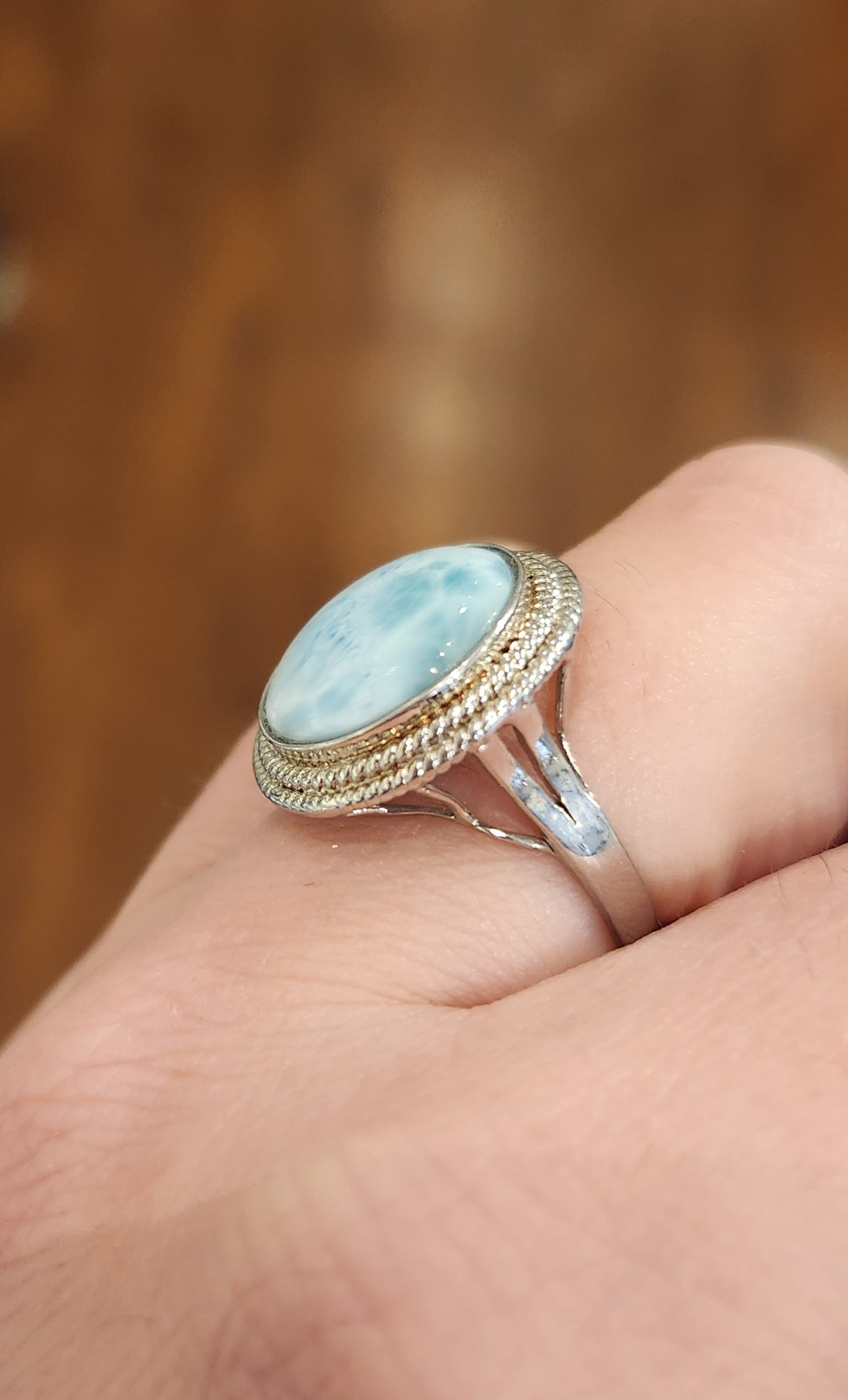 Sterling silver ring with round larimar cabochon