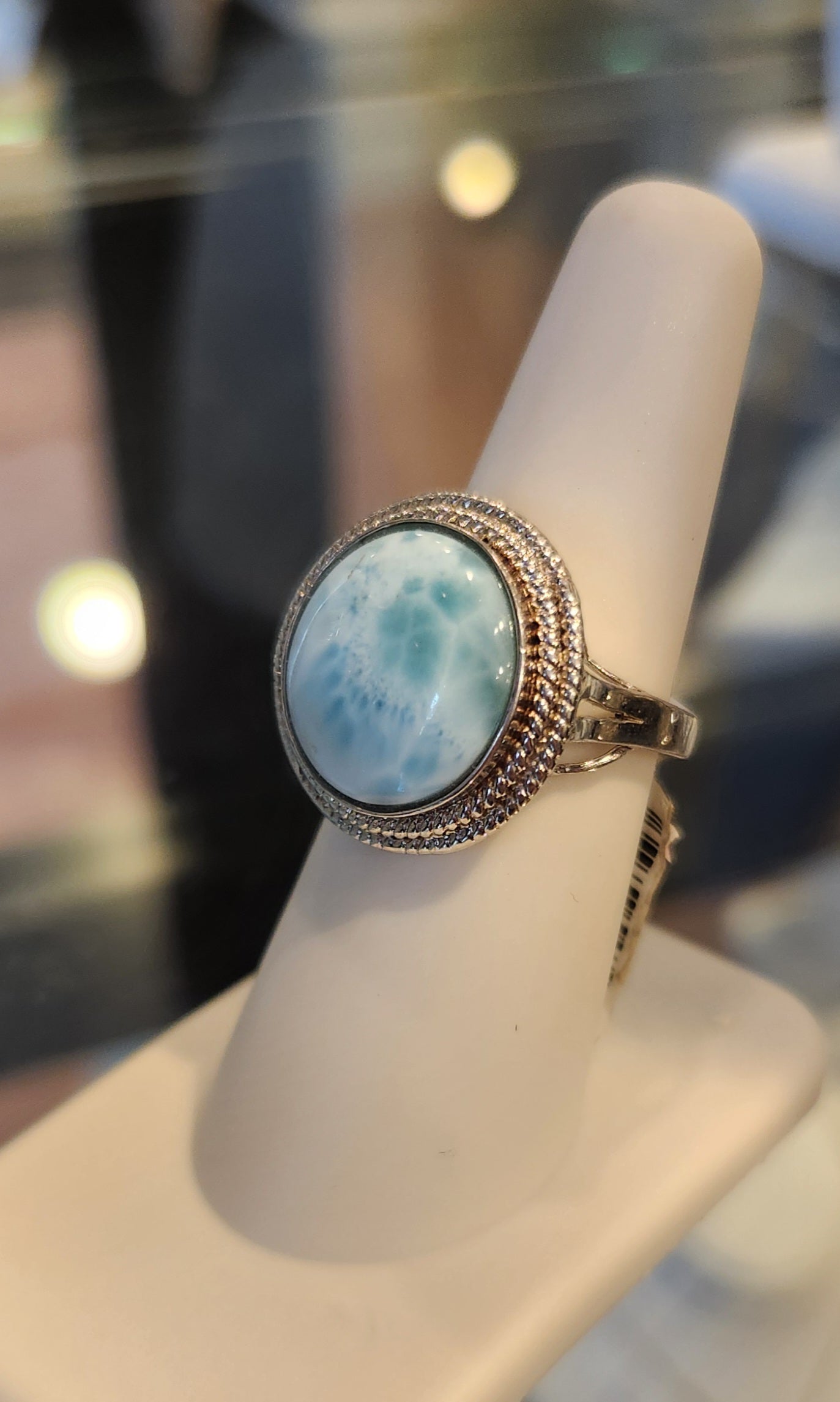 Sterling silver ring with round larimar cabochon