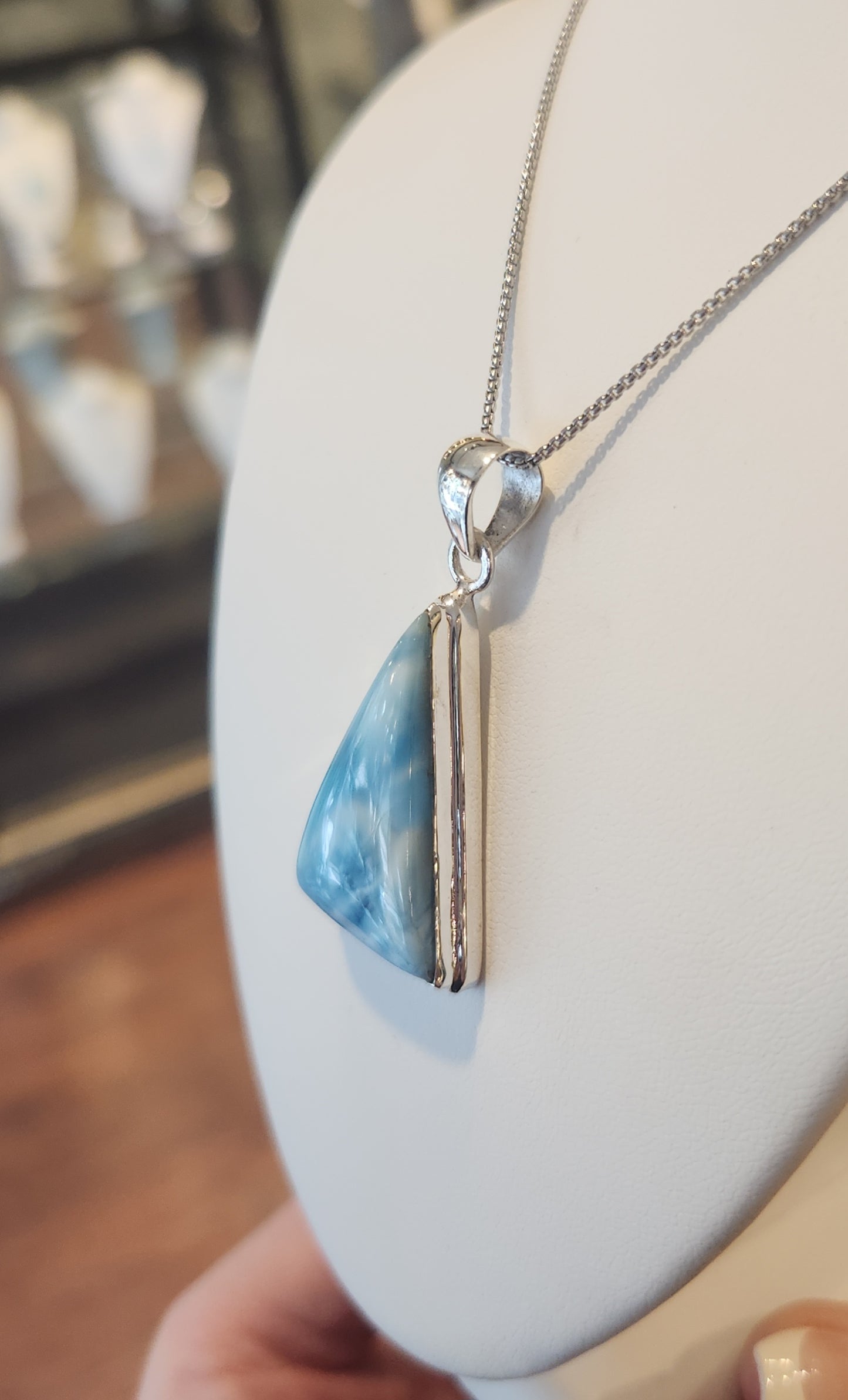 Sterling silver triangle-shaped larimar pendant