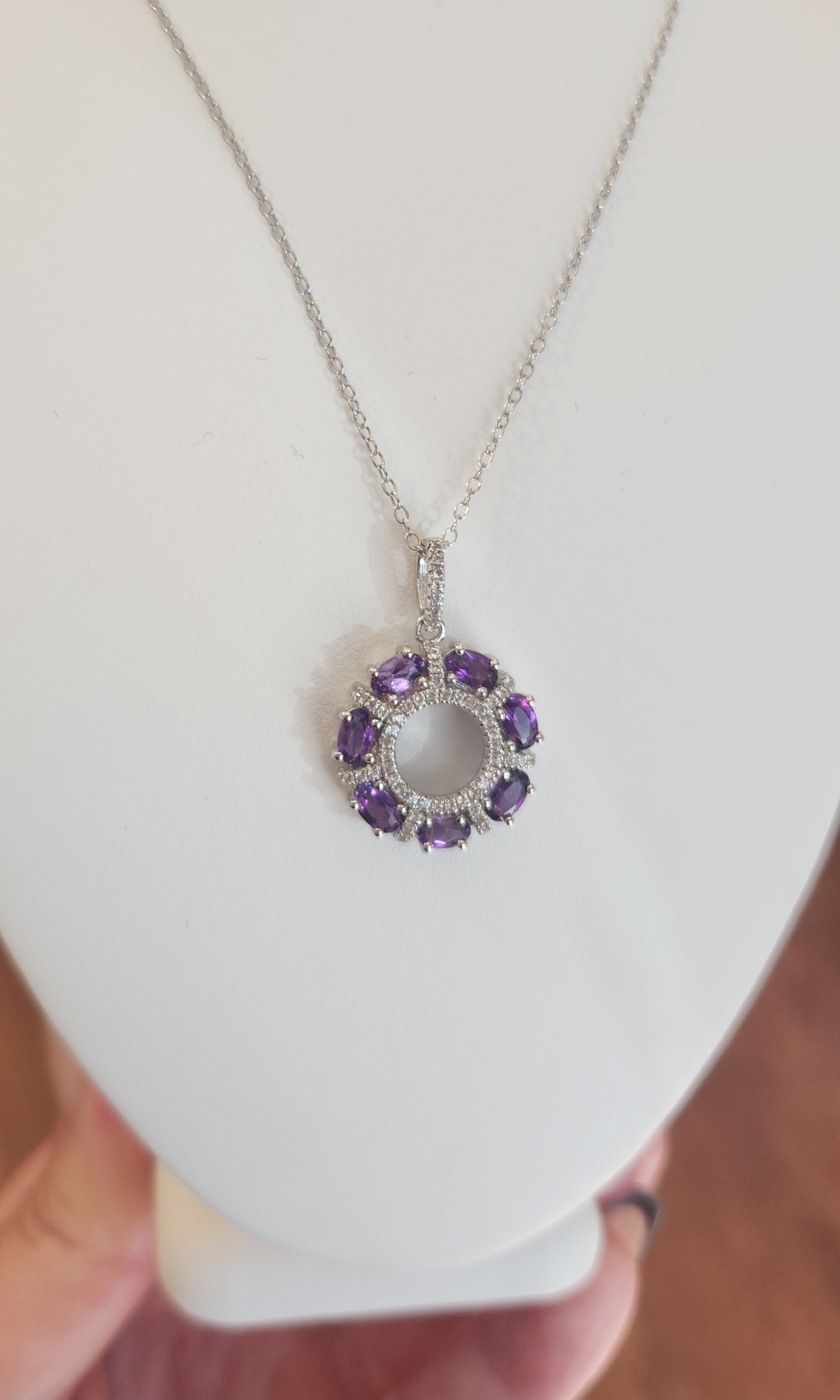 Sterling silver diamond and amethyst circle pendant