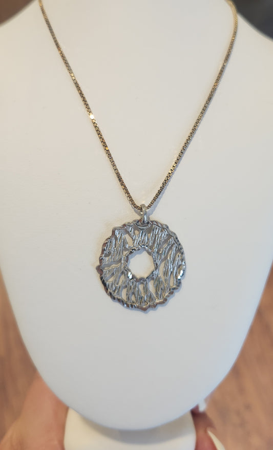 Sterling silver textured circle pendant